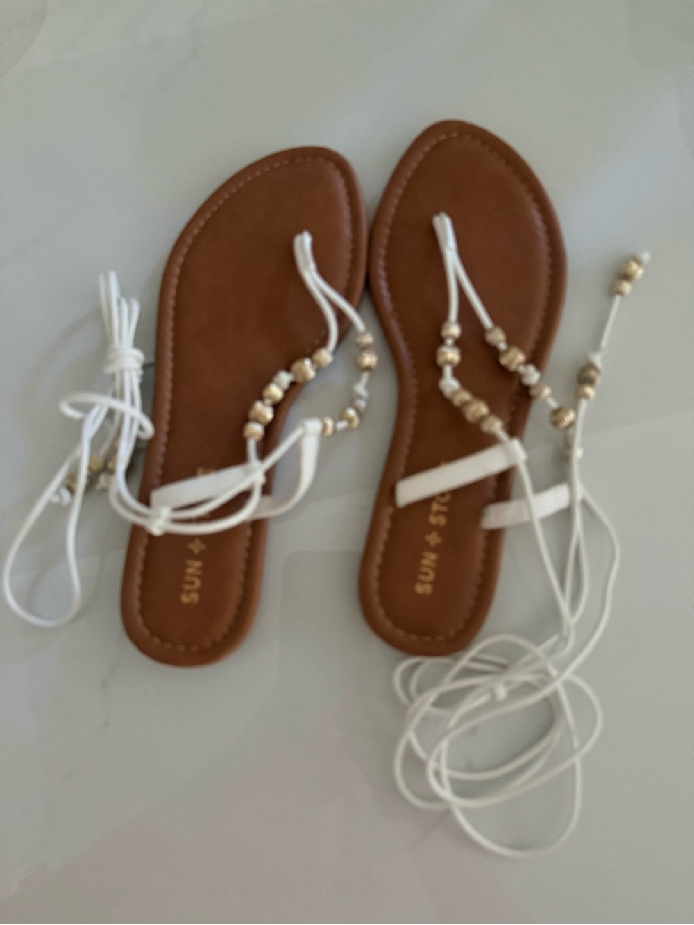 Sun + Stone flat Sandals with White Lace Straps.